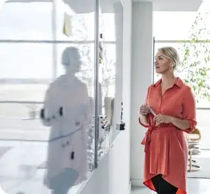 endava employee  standing at office whiteboard with dry erase marker