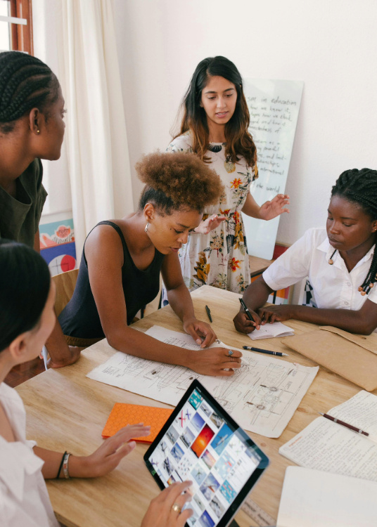 A group of women in an office working