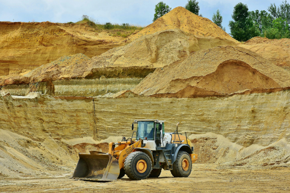 A front loader excavating in a quarry