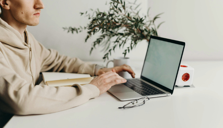 A man working on a  laptop