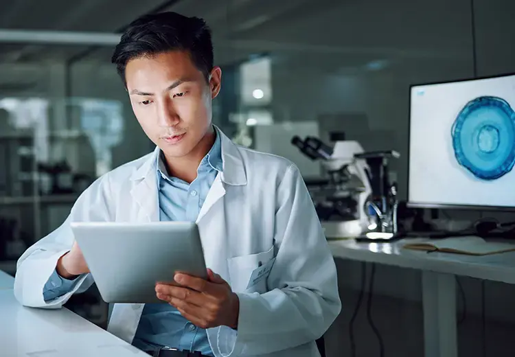 male doctor working on tablet