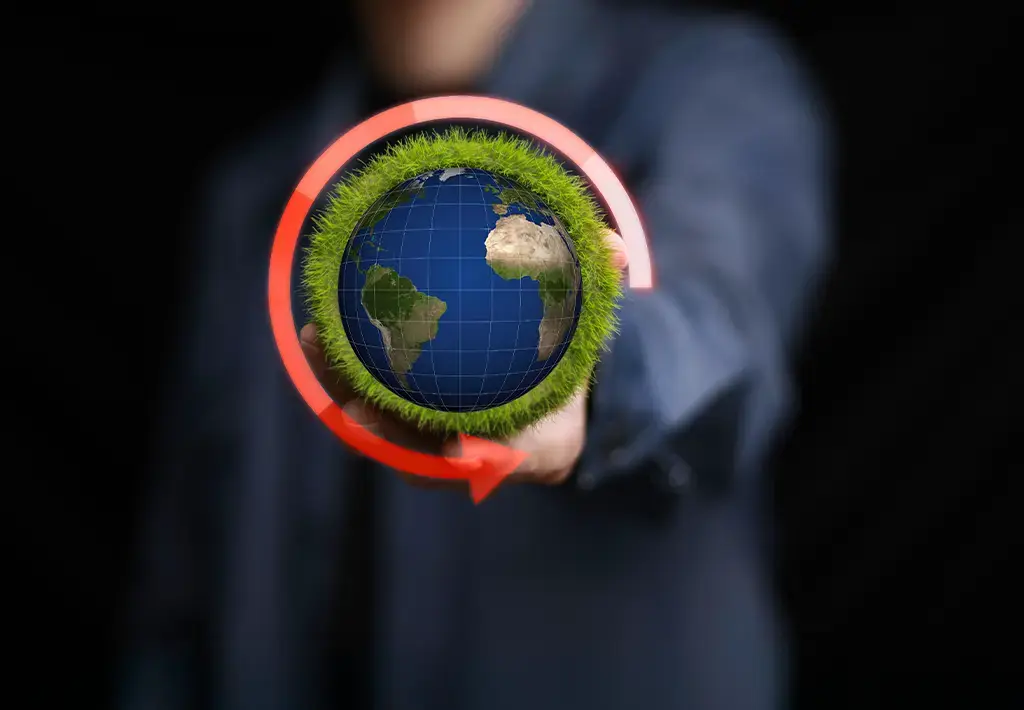 graphic of earth surrounded by green circle and red arrow representing circular supply chains