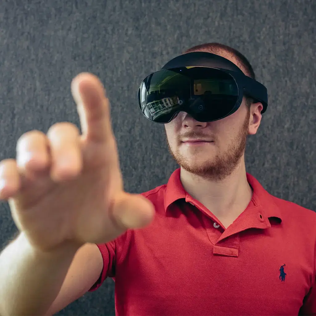 Young man experimenting with virtual reality