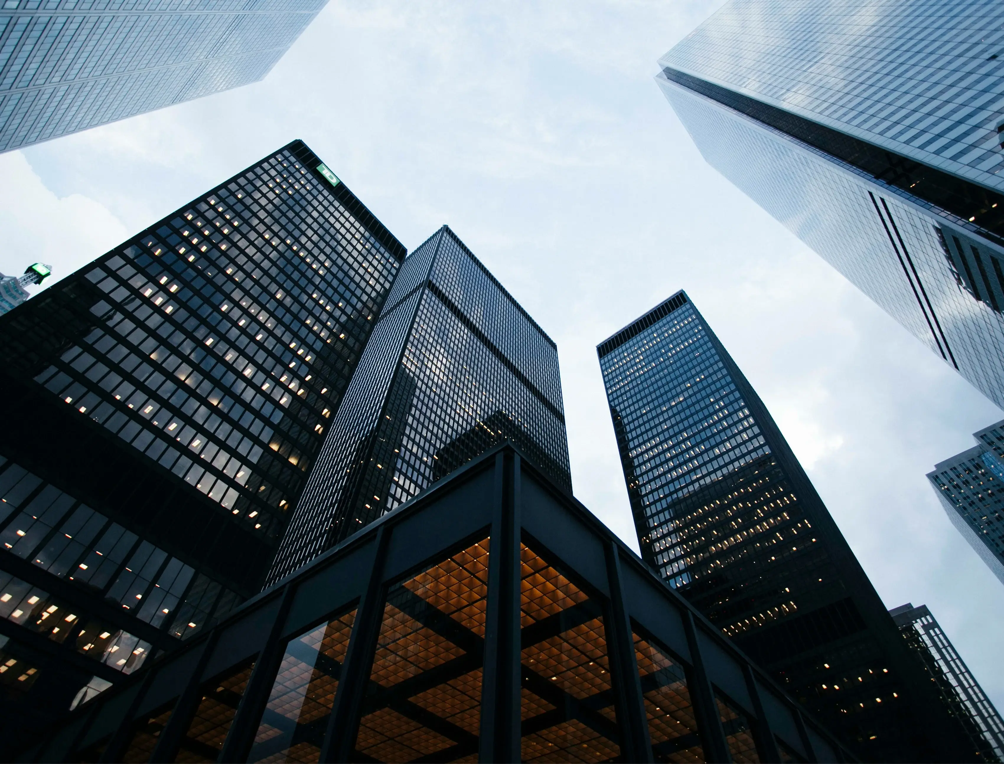 view looking up at skyscraper office buildings in downtown