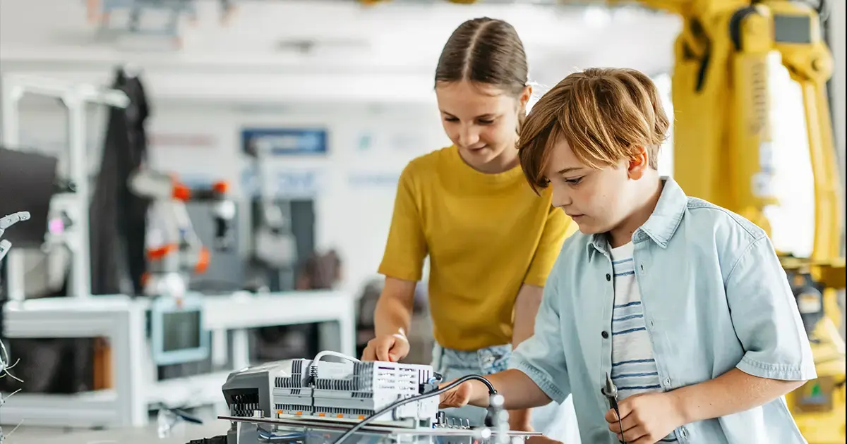 boy and girl working on circuitry