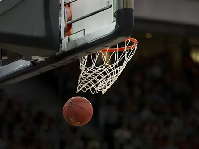 basket ball traveling through hoop loop