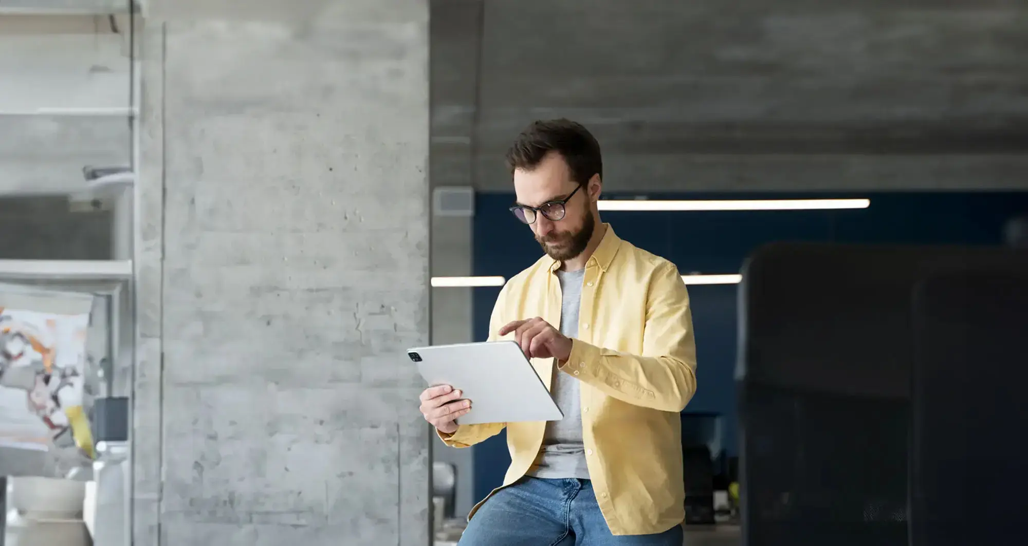 Man reading a whitepaper on his tablet