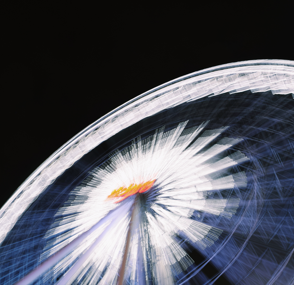 close-up-illuminated-ferris-wheel-text-block-image