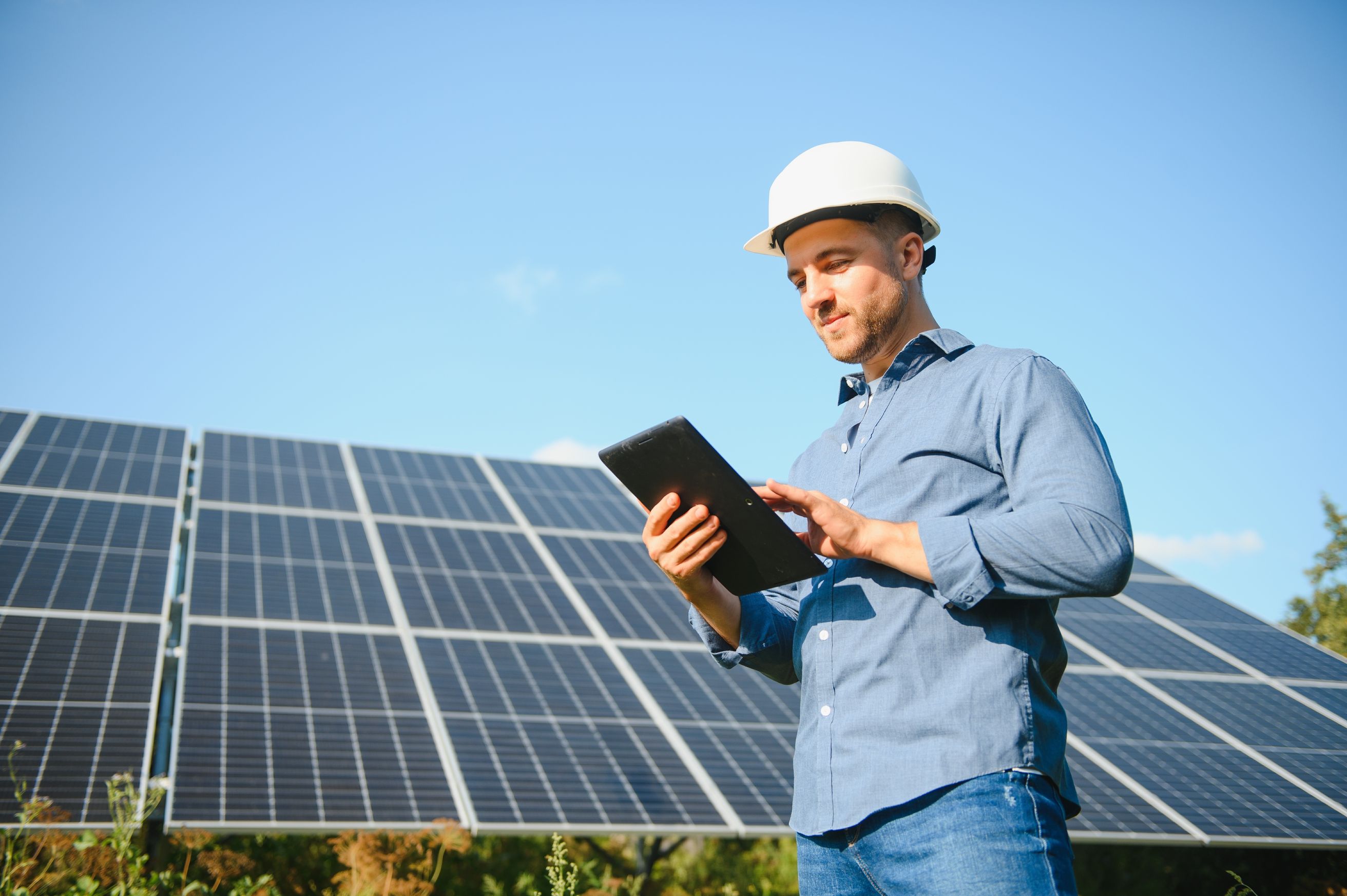 Energy and resources expert working on solar panels