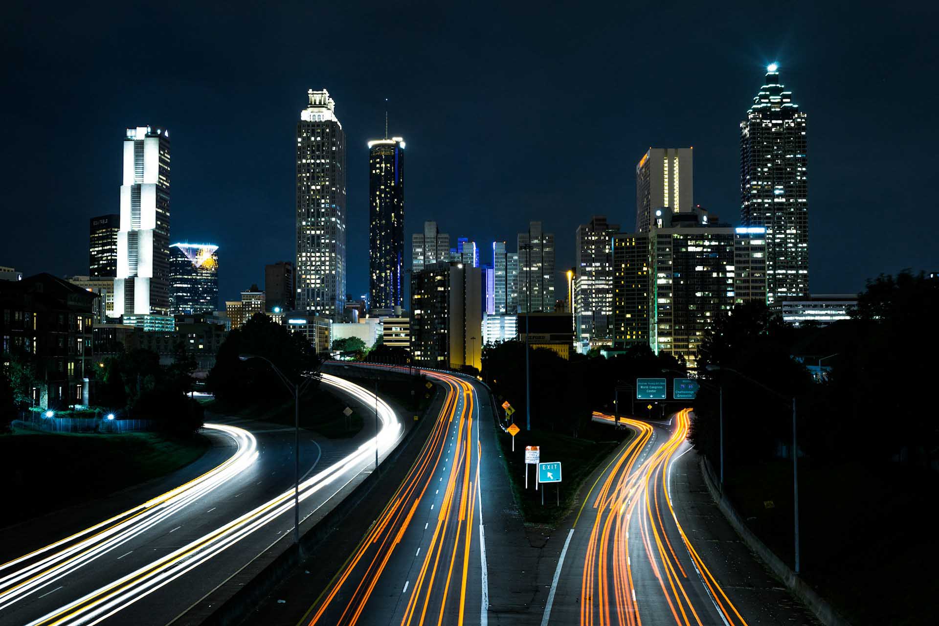 Cityscape at night with busy highways