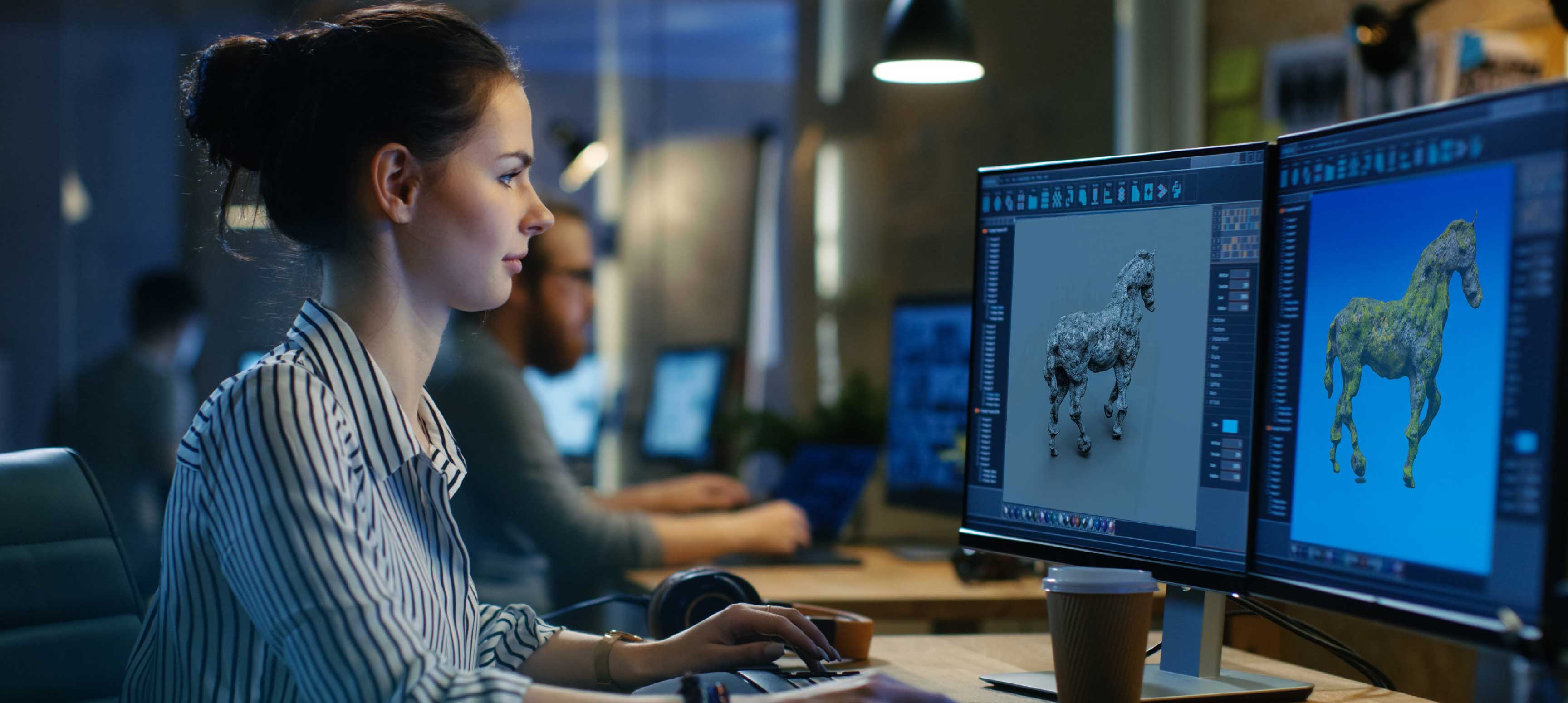 A female at the computer shaping an AI-Driven 3D creation
