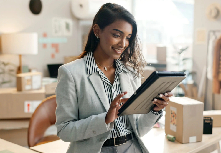 Business owner checking orders on tablet